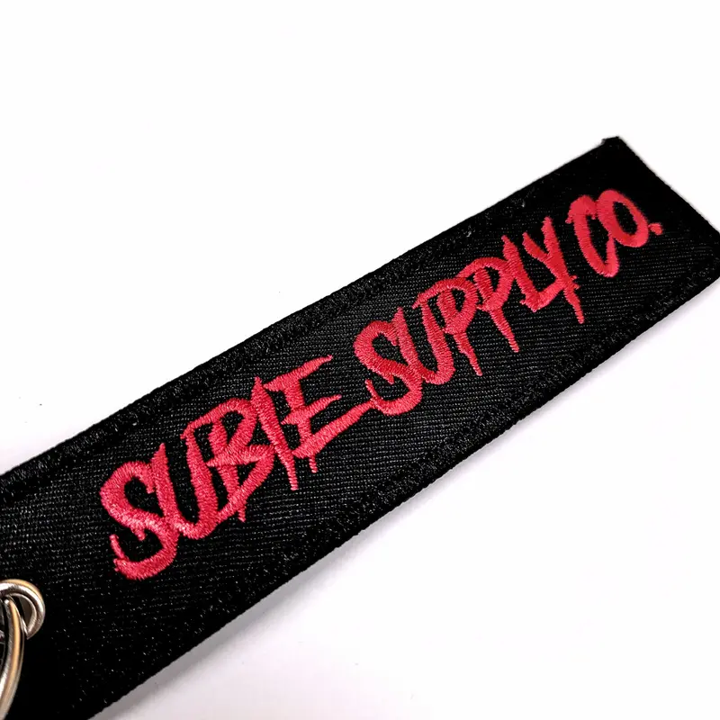 Subie Supply Co Jet Tag - Red 1